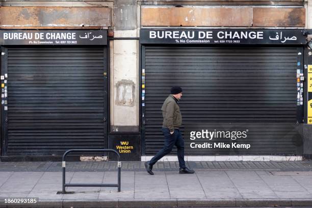 Bureau de change with shutters down on Edgware Road on 6th December 2023 in London, United Kingdom.