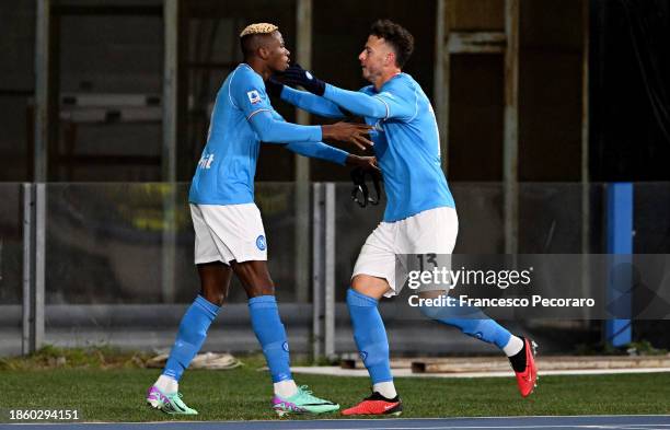 Victor Osimhen of SSC Napoli celebrates with teammate Amir Rrahmani after scoring their team's first goal during the Serie A TIM match between SSC...