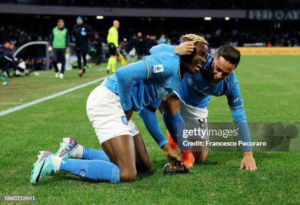 Victor Osimhen of SSC Napoli celebrates with teammate Giacomo Raspadori after scoring their team's first goal during the Serie A TIM match between...