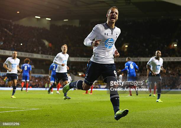 Roberto Soldado of Spurs celebrates scoring their first goal during the Barclays Premier League match between Tottenham Hotspur and Hull City at...