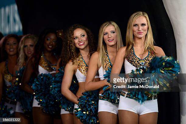 Cheerleaders wait to perform ahead of the NFL International Series game between San Francisco 49ers and Jacksonville Jaguars at Wembley Stadium on...
