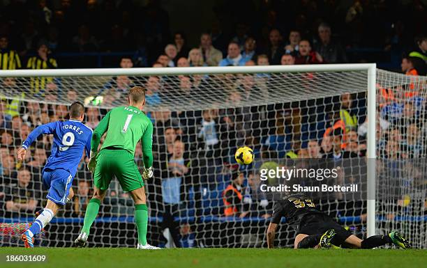 Joe Hart and Matija Nastasic of Manchester City look on as Fernando Torres of Chelsea scores their second goal during the Barclays Premier League...