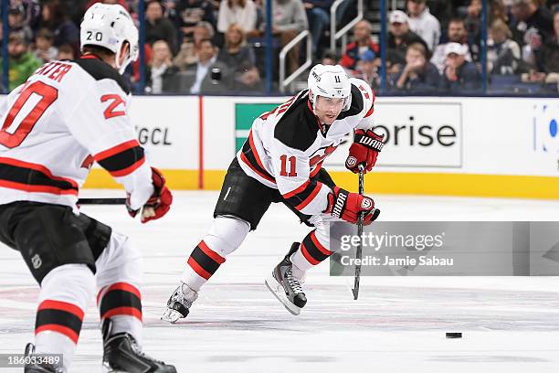 Stephen Gionta of the New Jersey Devils skates with the puck against the Columbus Blue Jackets on October 22, 2013 at Nationwide Arena in Columbus,...
