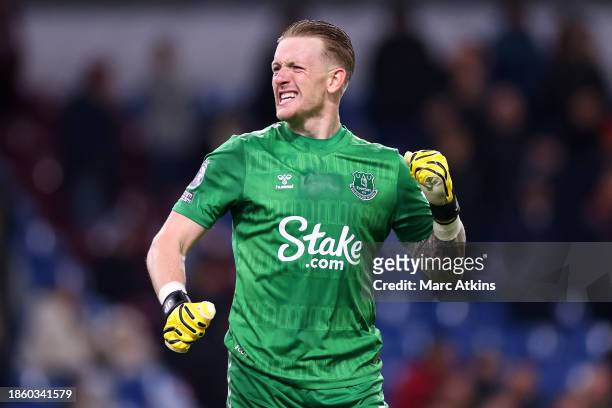 Jordan Pickford of Everton celebrates after the team's victory during the Premier League match between Burnley FC and Everton FC at Turf Moor on...