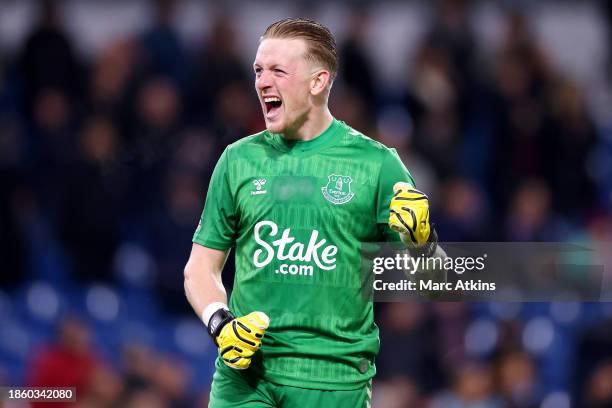 Jordan Pickford of Everton celebrates after the team's victory during the Premier League match between Burnley FC and Everton FC at Turf Moor on...