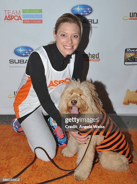 Actress April Bowlby and her dog Clementine attend the Rock 'n' Roll Los Angeles Halloween Half-Marathon benefitting The ASPCA at L.A. LIVE on...