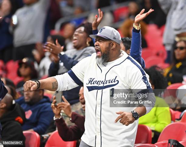 Howard University fans celebrate during the Celebration Bowl game between Howard and Florida A&M Cricket teams, held at Mercedes-Benz Stadium on...