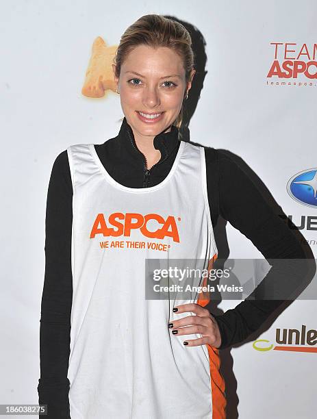 Actress April Bowlby and her dog Clementine attend the Rock 'n' Roll Los Angeles Halloween Half-Marathon benefitting The ASPCA at L.A. LIVE on...