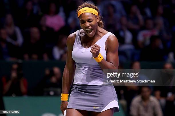 Serena Williams of the United States celebrates a point against Na Li of China during the final of the TEB BNP Paribas WTA Championships at the Sinan...