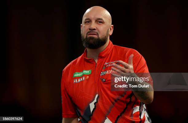 Jamie Hughes of England looks on in his First Round match against David Cameron of Canada on Day Two of 2023/24 Paddy Power World Darts Championship...