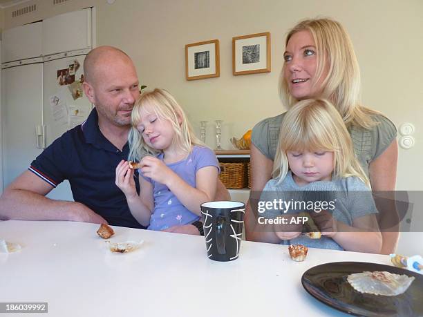 SULLIVANSwedish family Maerestad sit at their kitchen table in their home in Stockholm, Sweden on October 13, 2013. Sweden had a head start in the...