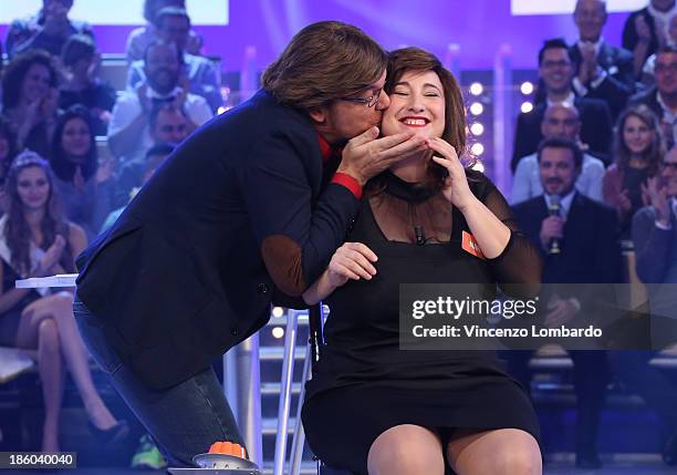 Corrado Nuzzo and Maria Di Biase attend 'Quelli Che Il Calcio' Italian TV Show on October 27, 2013 in Milan, Italy.