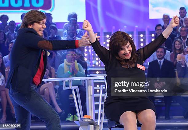 Corrado Nuzzo and Maria Di Biase attend 'Quelli Che Il Calcio' Italian TV Show on October 27, 2013 in Milan, Italy.