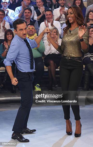 Nicola Savino and Ainett Stephens dancing during 'Quelli Che Il Calcio' Italian TV Show on October 27, 2013 in Milan, Italy.