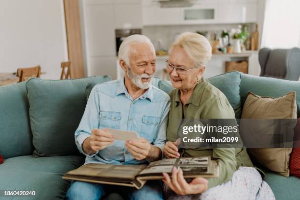 going down the memory lane - looking at old photo stock pictures, royalty-free photos & images