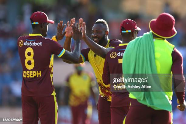 Andre Russell of West Indies celebrates the wicket of Jos Buttler of England during the 3rd T20 International match between West Indies and England...