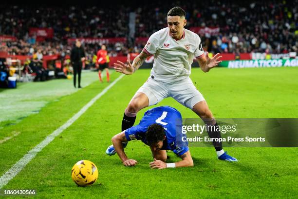 Lucas Ocampos of Sevilla FC and Jaime Mata of Getafe CF in action during the Spanish league, LaLiga EA Sports, football match played between Sevilla...