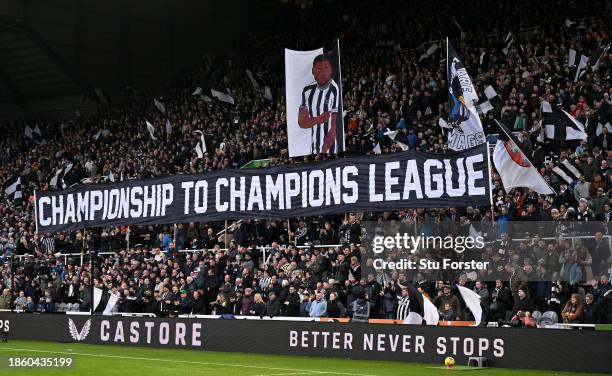 Flag in the Gallowgate End reads 'From Championship to Champions League' prior to the Premier League match between Newcastle United and Fulham FC at...