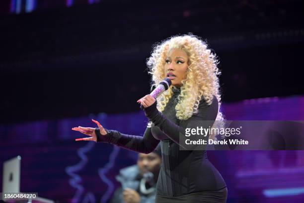 Nicki Minaj performs onstage during iHeartRadio Power 96.1's Jingle Ball 2023 at State Farm Arena on December 14, 2023 in Atlanta, Georgia.