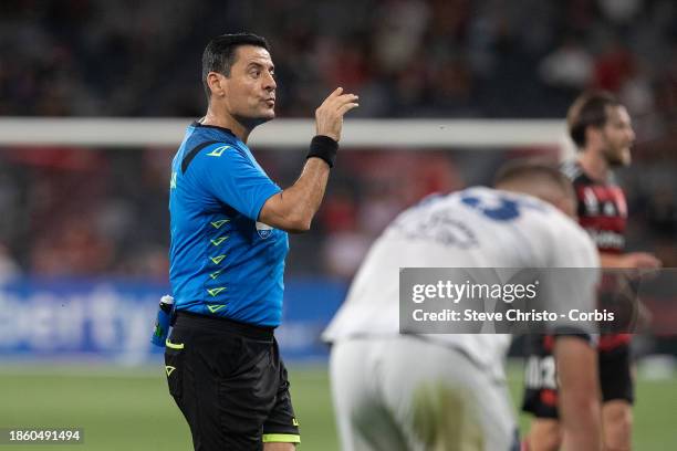 Referee Alireza Faghani speaks to players during the A-League Men round eight match between Western Sydney Wanderers and Adelaide United at CommBank...