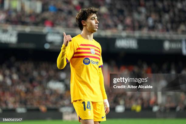 Joao Felix of FC Barcelona celebrates after scoring their team's first goal during the LaLiga EA Sports match between Valencia CF and FC Barcelona at...