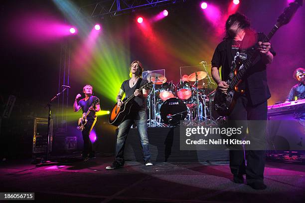 Brad Fernquist, John Rzenik, Mike Malinin, Robby Takac and Karel Tunador of Goo Goo Dolls performs at 02 academy on October 20, 2013 in Leeds,...