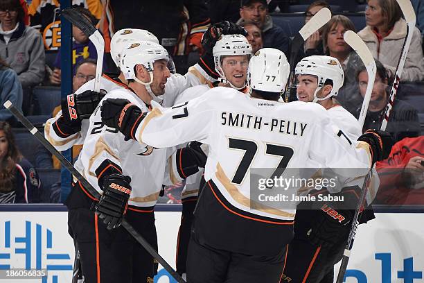 Peter Holland of the Anaheim Ducks celebrates his first period goal with his teammates on October 27, 2013 at Nationwide Arena in Columbus, Ohio.