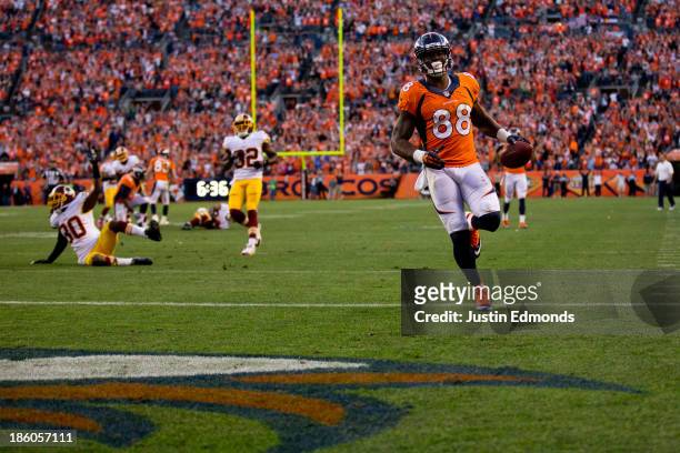 Wide receiver Demaryius Thomas of the Denver Broncos strides into the end zone for a 35-yard touchdown reception during the fourth quarter against...