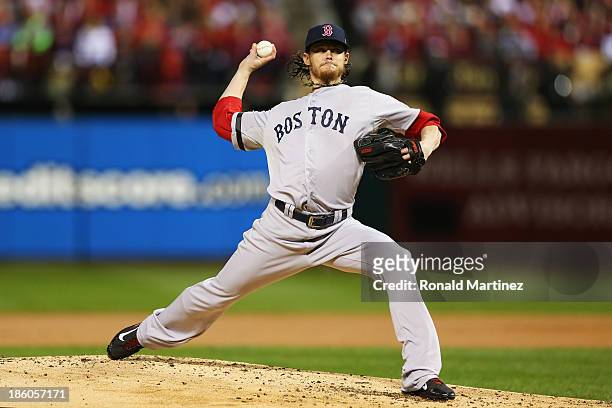 Clay Buchholz of the Boston Red Sox throws a pitch in the first inning against the St. Louis Cardinals during Game Four of the 2013 World Series at...