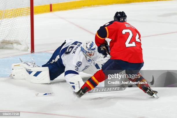 Brad Boyes of the Florida Panthers scores a goal during the shoot-out past goaltender Anders Lindback of the Tampa Bay Lightning at the BB&T Center...