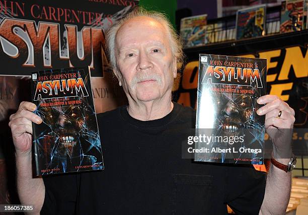 Director John Carpenter sign copies of his first comic book "Asylum" held at Golden Apple Comics on October 27, 2013 in Los Angeles, California.