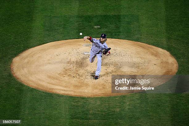 Clay Buchholz of the Boston Red Sox throws a pitch against the St. Louis Cardinals during Game Four of the 2013 World Series at Busch Stadium on...