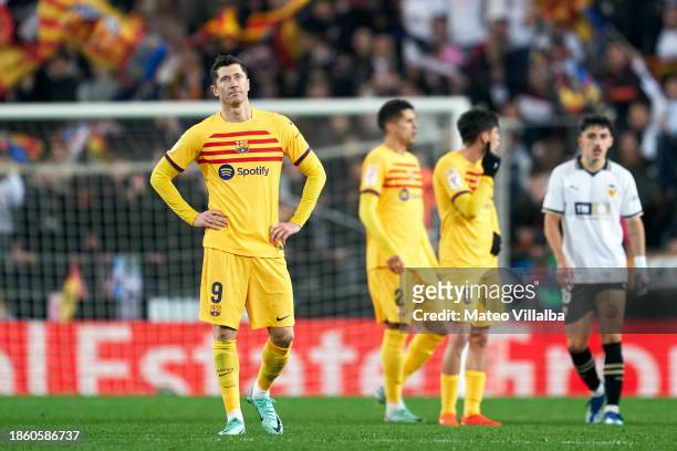 Robert Lewandowski of FC Barcelona reacts during the LaLiga EA Sports match between Valencia CF and FC Barcelona at Estadio Mestalla on December 16,...