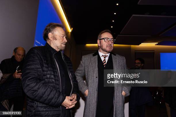 Franco Nero and Kevin Spacey attend as Franco Nero and Kevin Spacey read Gabriele Tinti's poems at Palazzo Massimo alle Terme on December 16, 2023 in...