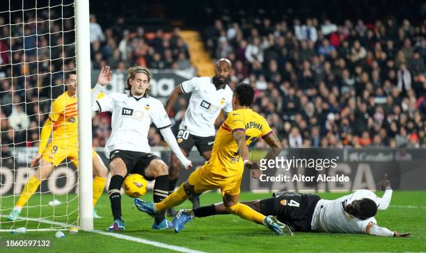 Raphinha of FC Barcelona shoots during the LaLiga EA Sports match between Valencia CF and FC Barcelona at Estadio Mestalla on December 16, 2023 in...