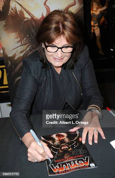 Co-creator Sandy King signs copies of comic book "Asylum" held at Golden Apple Comics on October 27, 2013 in Los Angeles, California.