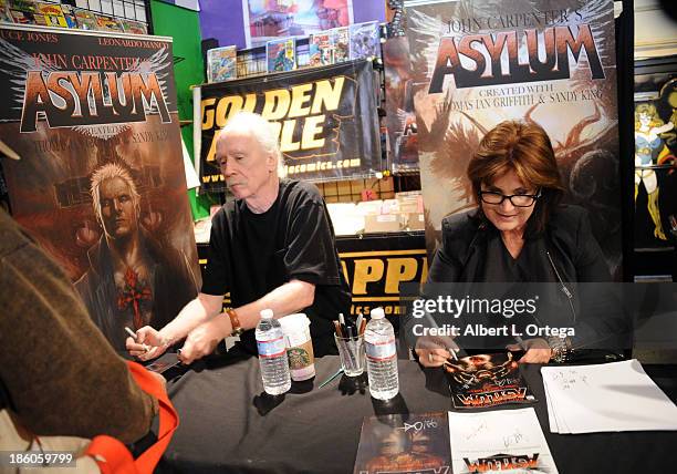 Director John Carpenter and co-creator Sandy King sign copies of comic book "Asylum" held at Golden Apple Comics on October 27, 2013 in Los Angeles,...