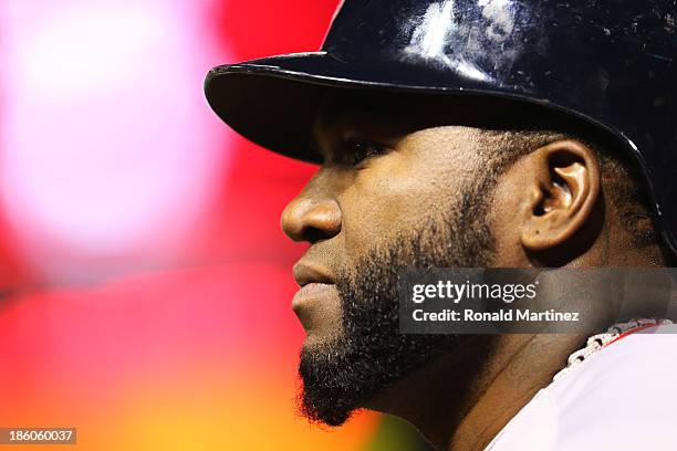 David Ortiz of the Boston Red Sox looks on against the St. Louis Cardinals during Game Four of the 2013 World Series at Busch Stadium on October 27,...