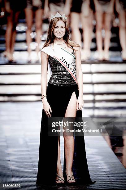 Newly elected 19-year-old Giulia Arena is crowned with the title of Miss Italia 2013 during the final of the beauty pageant contest 2013 at the Pala...