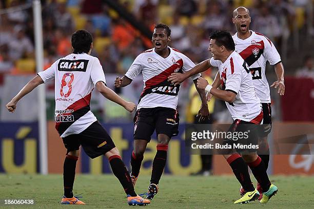 Marquinhos of Vitoria celebrates a scored goal during a match between Fluminense and Vitoria as part of Brazilian Serie A 2013 at Aterro do Flamengo...