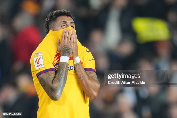 Raphinha of FC Barcelona reacts after the LaLiga EA Sports match between Valencia CF and FC Barcelona at Estadio Mestalla on December 16, 2023 in...