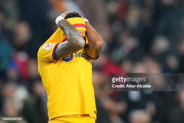 Raphinha of FC Barcelona reacts after the LaLiga EA Sports match between Valencia CF and FC Barcelona at Estadio Mestalla on December 16, 2023 in...