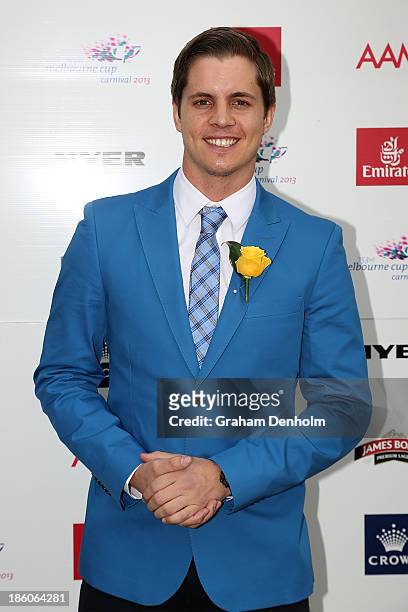 Emirates Stakes Day Fashion on the Field Ambassador Johnny Ruffo poses at the 2013 Melbourne Cup Carnival Launch at Flemington Racecourse on October...