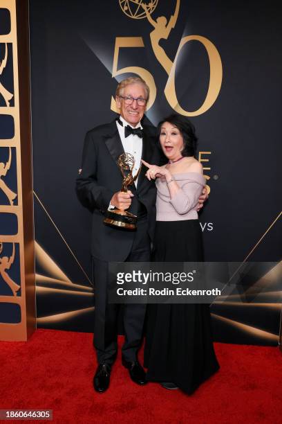 Maury Povich, winner of the Lifetime Achievement award, and Connie Chung pose in the press room during the 50th Daytime Emmy Creative Arts and...