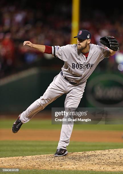 John Lackey of the Boston Red Sox pitches in the bottom of the eighth inning of Game 4 of the 2013 World Series against the St. Louis Cardinals at...