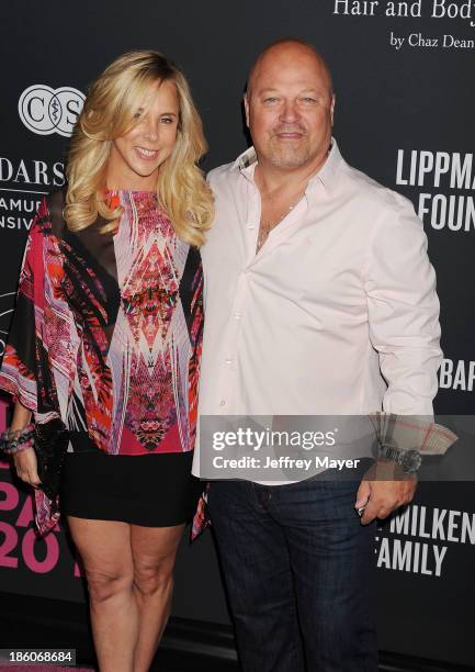 Actor Michael Chiklis and Michelle Chiklis attend The Pink Party 2013 at Barker Hangar on October 19, 2013 in Santa Monica, California.