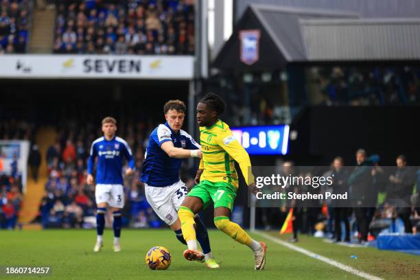 Nathan Broadhead of Ipswich Town and Jonathan Rowe of Norwich City compete for the ball during the Sky Bet Championship match between Ipswich Town...