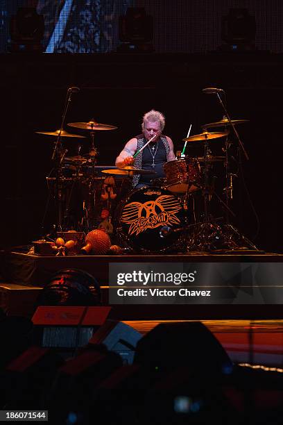 Joey Kramer of Aerosmith performs on stage at Arena Ciudad de México on October 27, 2013 in Mexico City, Mexico.