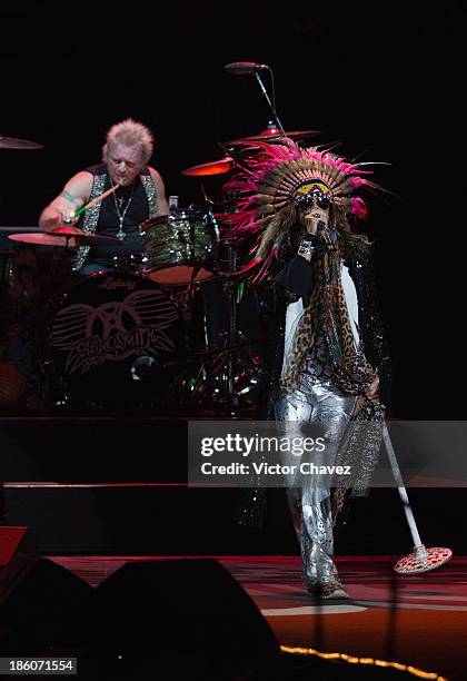 Joey Kramer and singer Steven Tyler of Aerosmith perform on stage at Arena Ciudad de México on October 27, 2013 in Mexico City, Mexico.