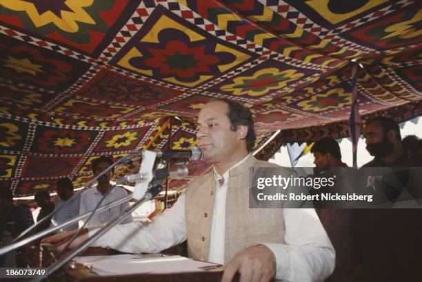 Prime Minister of Pakistan Nawaz Sharif talking to a crowd in Pakistan, circa 1990.